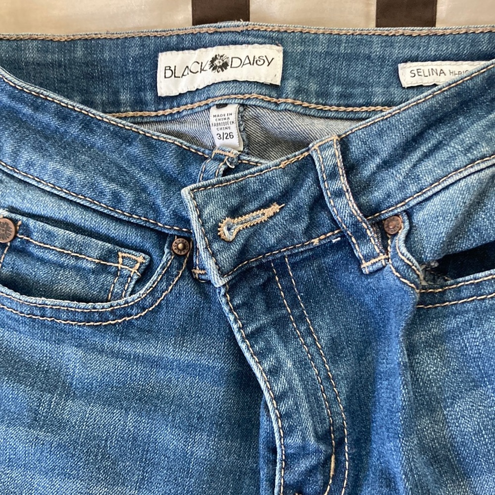 like new black daisy jeans